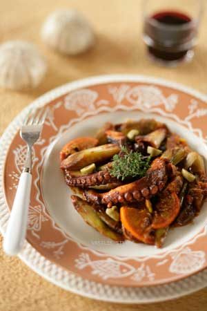 Braised octopus with caramelized leeks, oranges, mixed olives