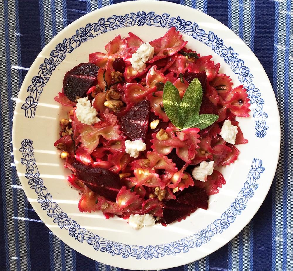 Bow-tie pasta with smoked beets, Greek cheese and walnuts