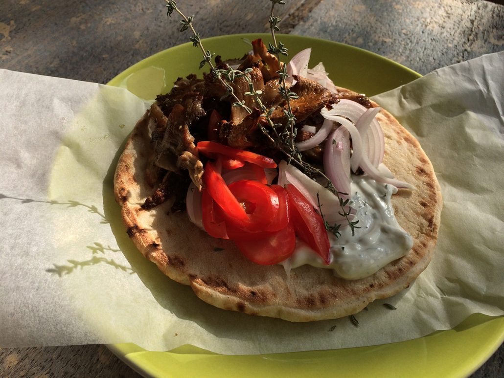 Mushroom gyro on pita sandwich