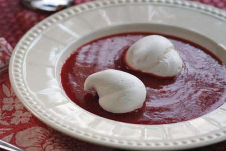 Meringues in a strawberry soup