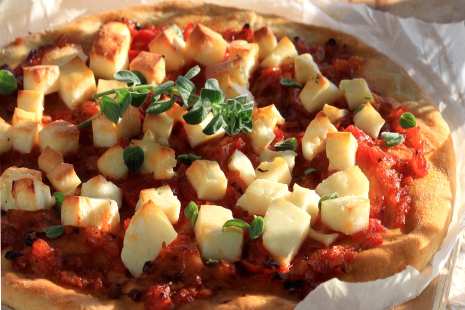 Santorini Pizza with Fava Crust, Tomatoes, Halloumi & Herbs