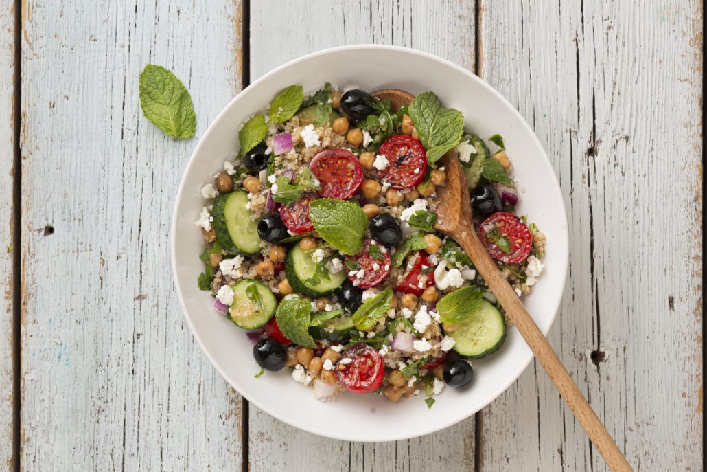 Greek salad with Quinoa and feta cheese. Recipe by Diane Kochilas