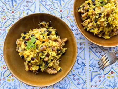 Leak walnut rice with saffron and currants. A recipe by Diane Kochilas.