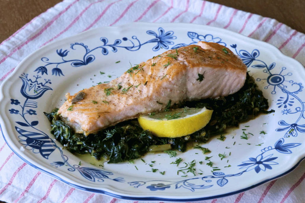 Ouzo Salmon Baked Over Greens