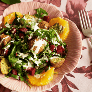 Greens & Beetroot Salad With Chickpea Fritters And Tahini Dressing